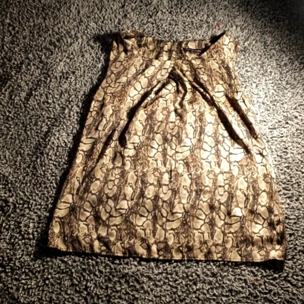 This is a snake skin size small tank top